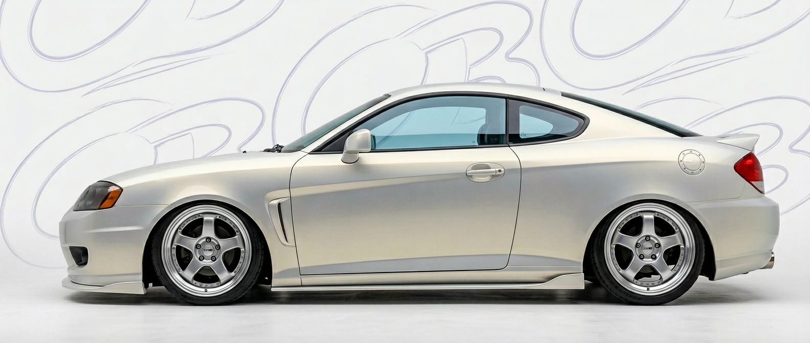 Aerodynamic 2003 Hyundai Tiburon 2003 - Sleek design for enhanced vehicle styling.