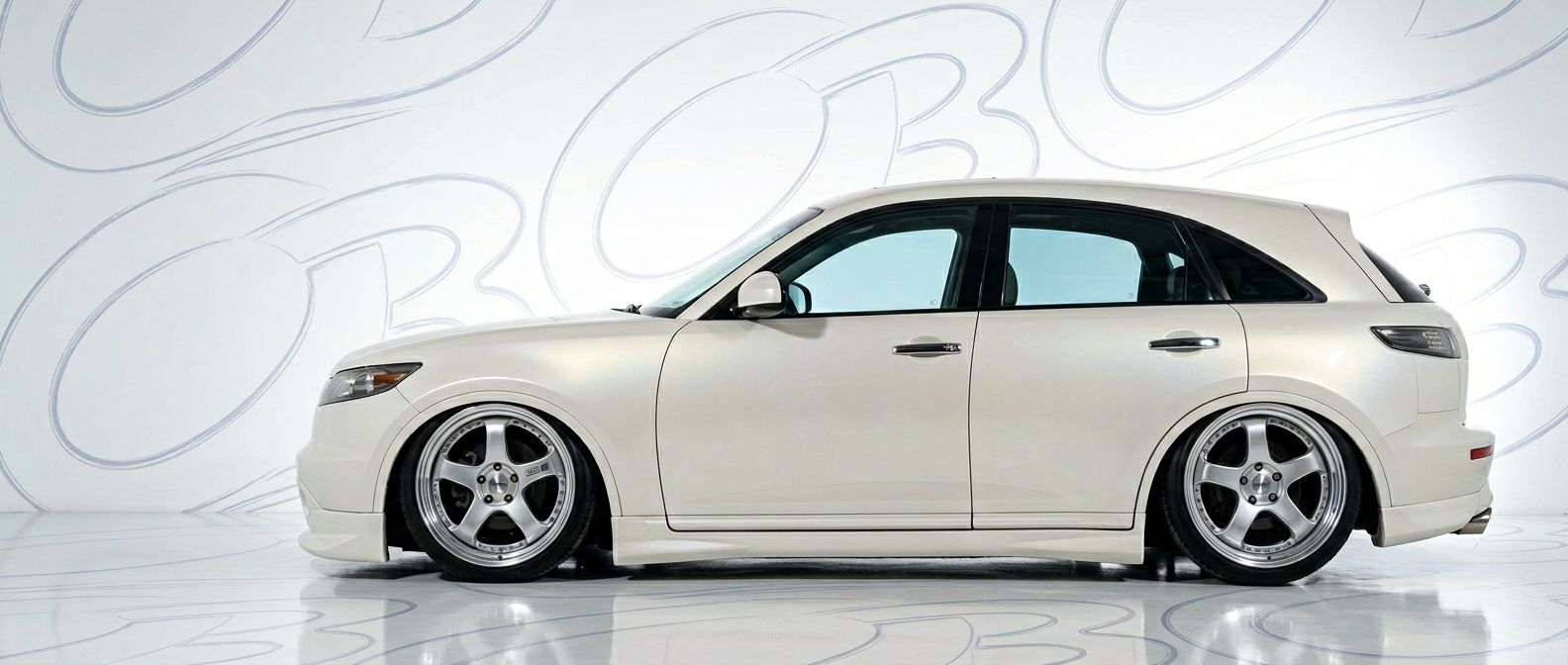 Professional automotive photography of a  Infiniti FX with high-fidelity FX.