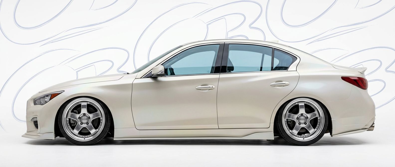 Professional automotive photography of a 2021 Infiniti Q50 with high-fidelity 2021.
