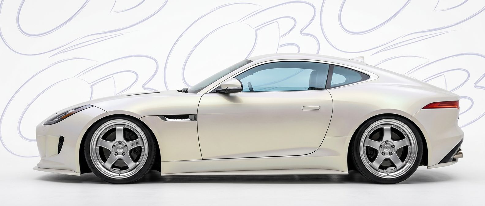Professional automotive photography of a 2016 Jaguar F-Type with high-fidelity 2016.