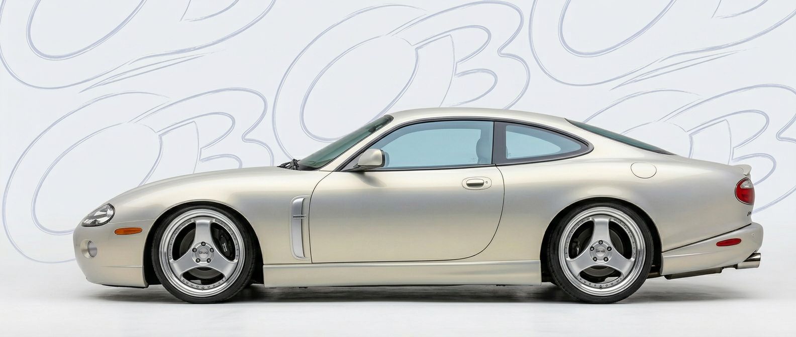 Top-tier 2007 Jaguar XK8 2007 featuring a high-gloss finish and carbon fiber weave.