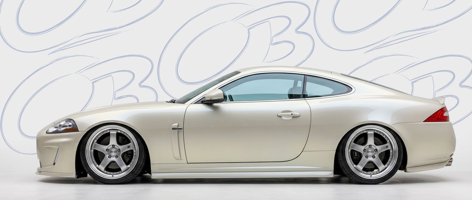 Custom 2008 for 2008 Jaguar XK8 - Premium aerodynamic automotive body parts.