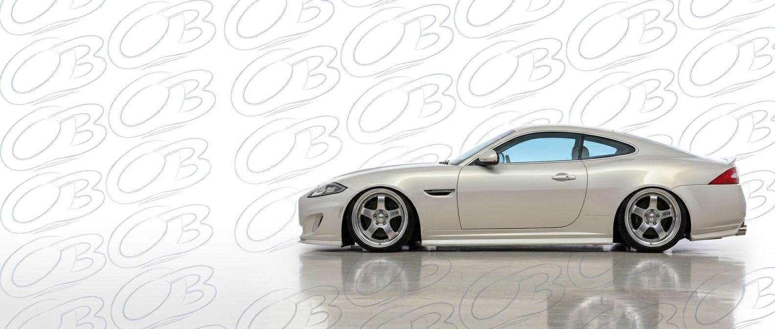 Professional automotive photography of a 2013 Jaguar XK8 with high-fidelity 2013.