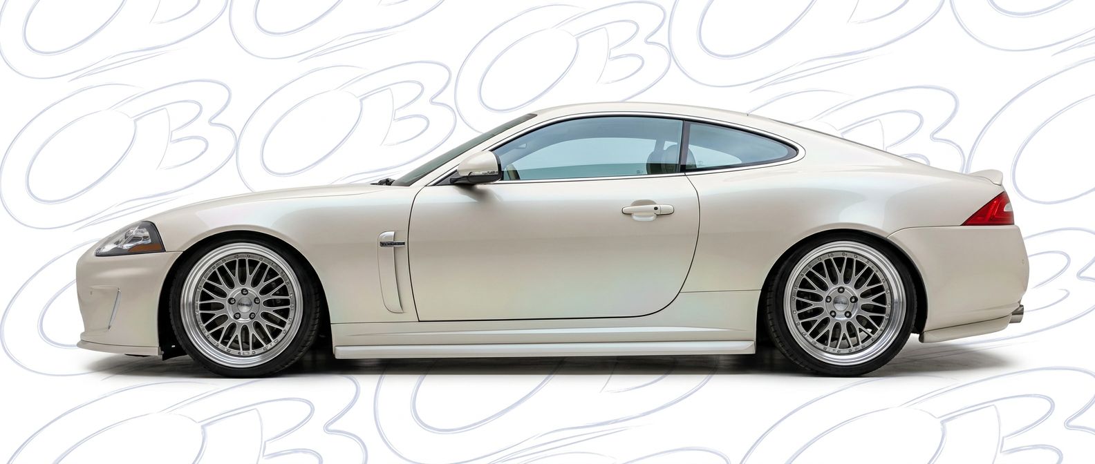 Top-tier 2014 Jaguar XK8 2014 featuring a high-gloss finish and carbon fiber weave.