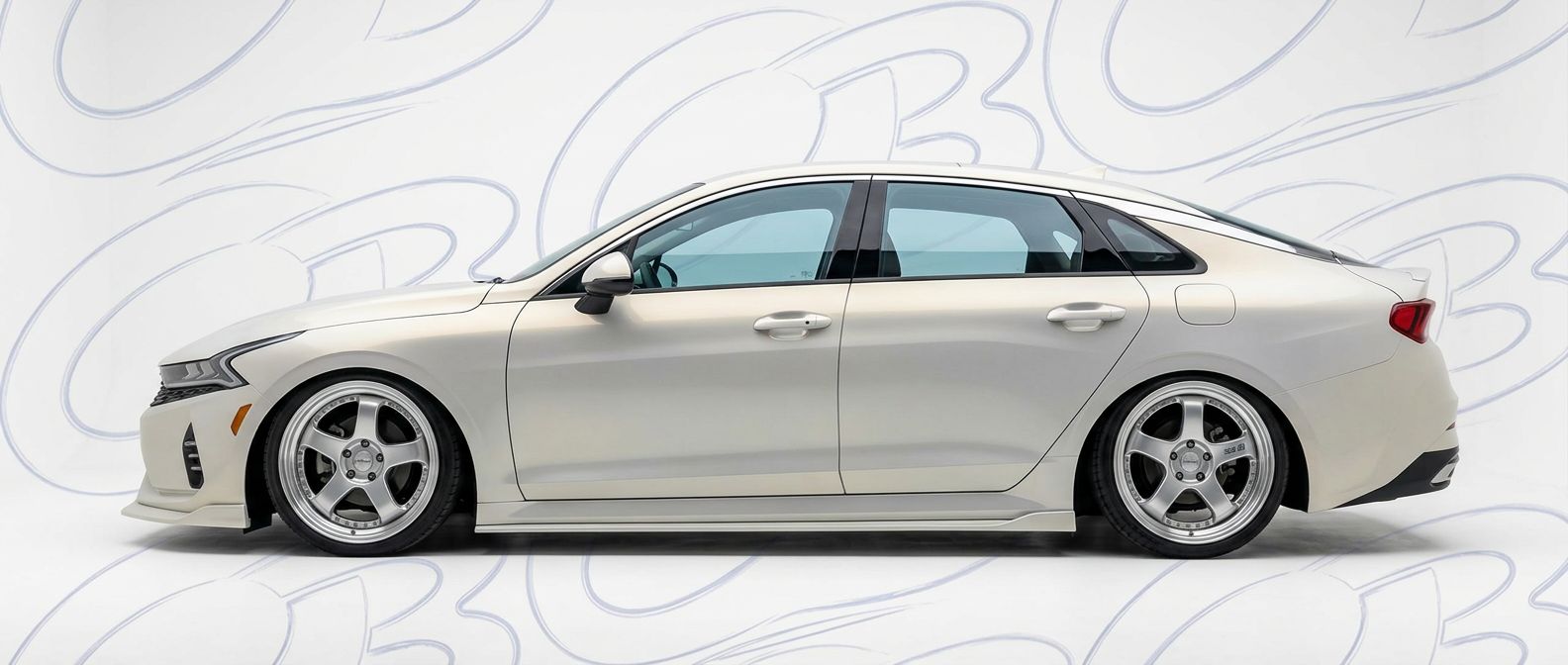 High-quality 2025 KIA K5 2025 exterior shot with professional studio lighting.
