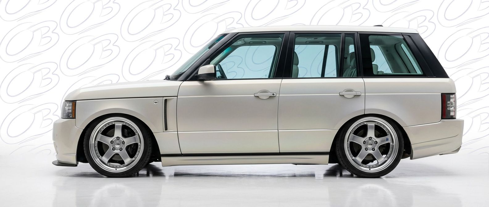 Top-tier 2012 Land Rover Range Rover 2012 featuring a high-gloss finish and carbon fiber weave.