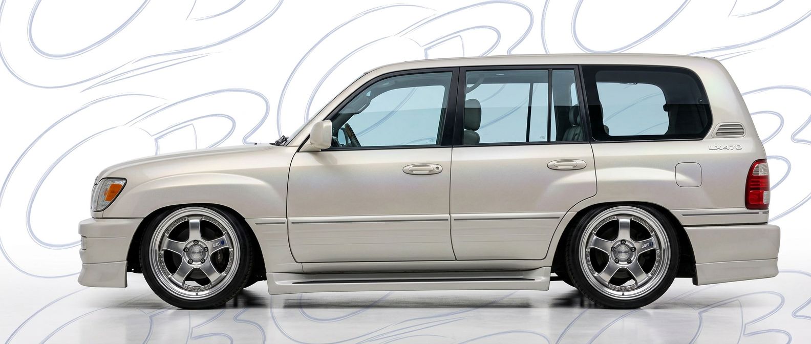Professional automotive photography of a 1999 Lexus LX470 with high-fidelity 1999.