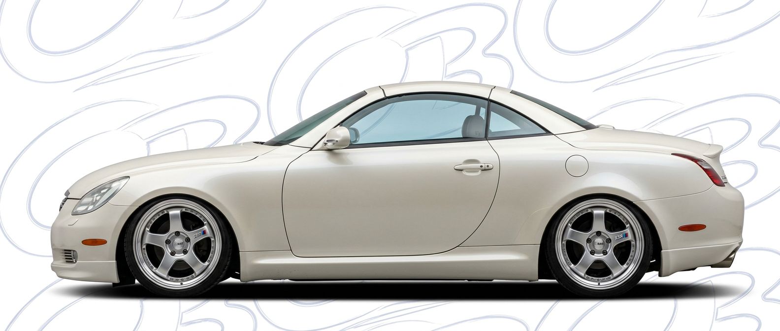 Top-tier 2005 Lexus SC430 2005 featuring a high-gloss finish and carbon fiber weave.