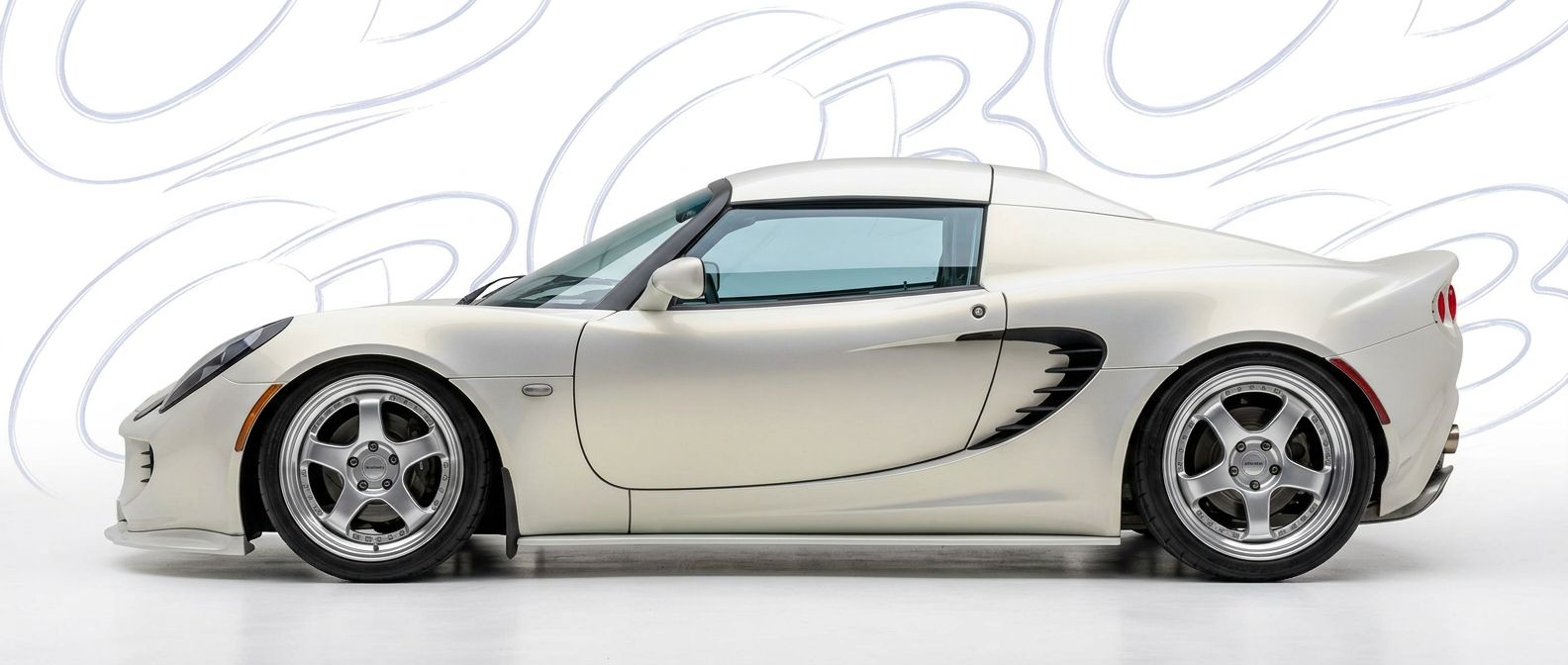 High-quality 2010 Lotus Elise 2010 exterior shot with professional studio lighting.
