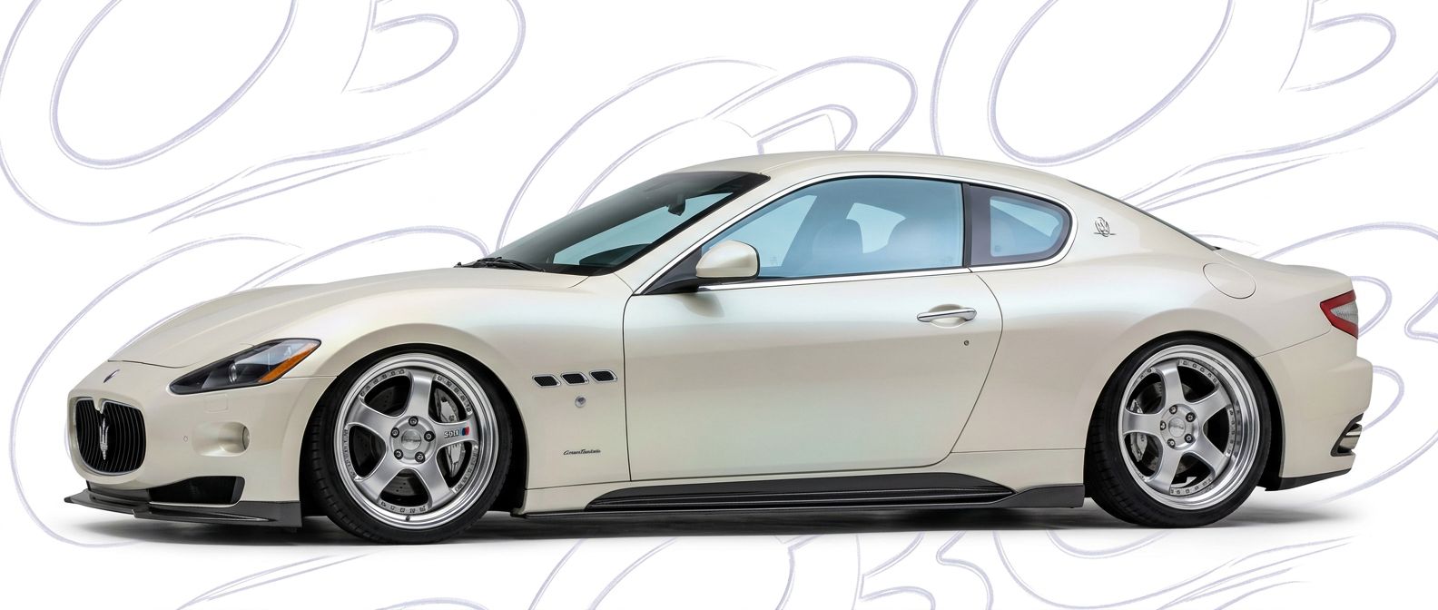 Top-tier 2009 Maserati GranTurismo 2009 featuring a high-gloss finish and carbon fiber weave.