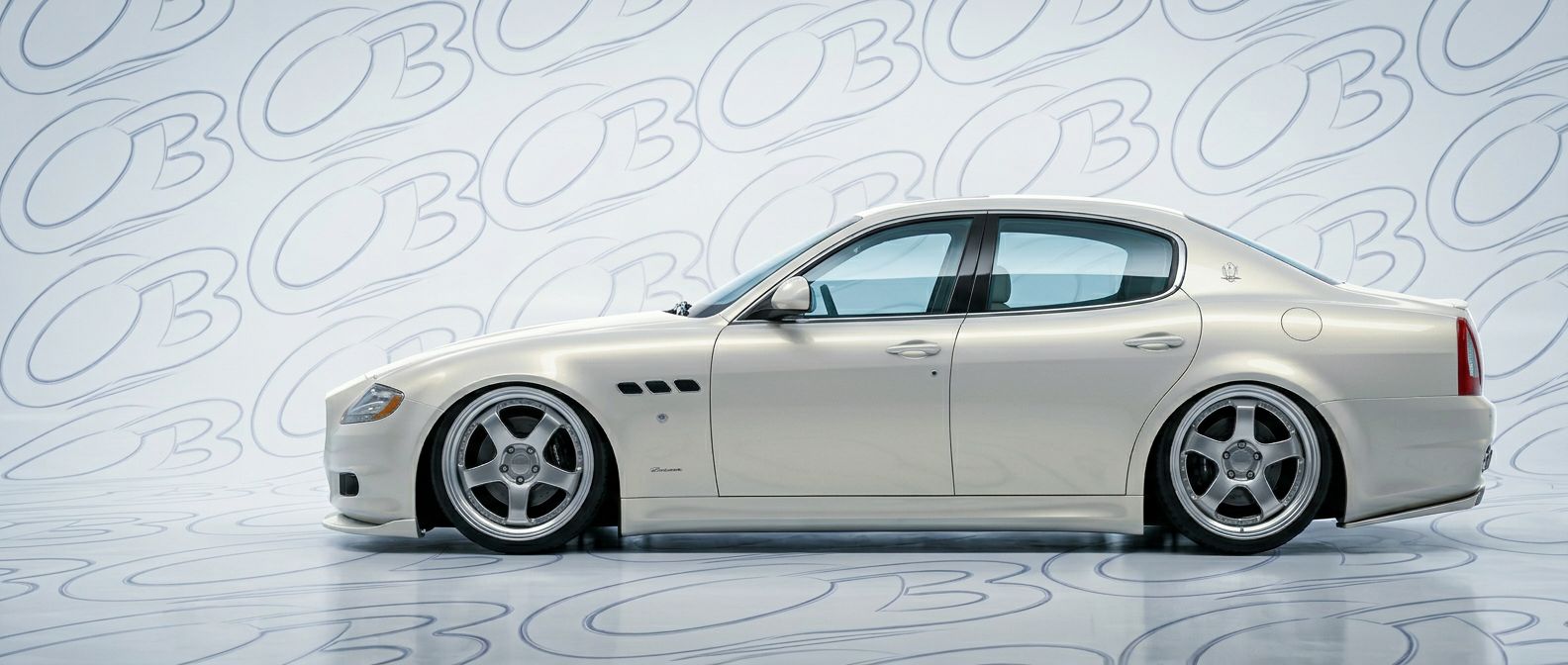 Front-angle view of 2010 Maserati Quattroporte 2010 - Durable and stylish exterior enhancement.