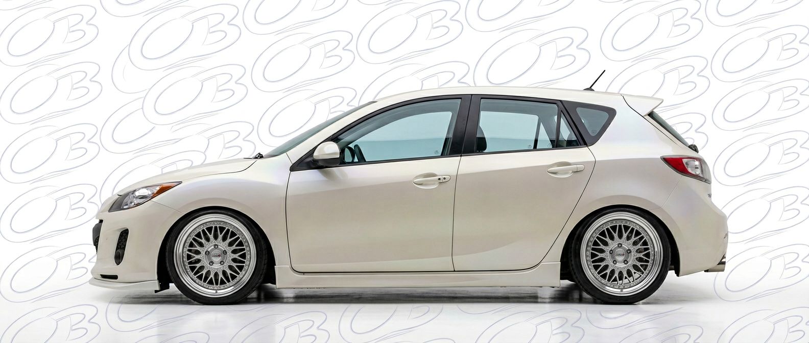 Top-tier 2012 Mazda 3 2012 featuring a high-gloss finish and carbon fiber weave.