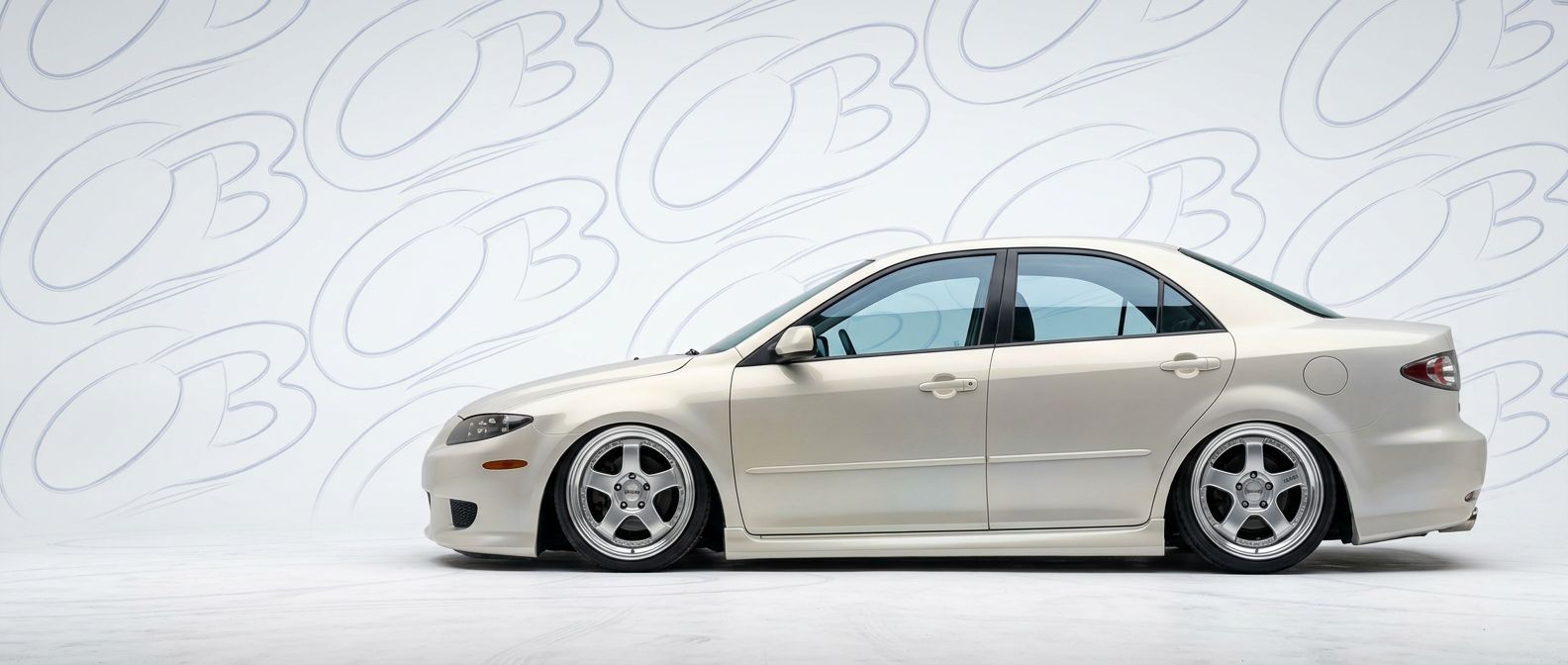 Professional automotive photography of a 2003 Mazda 6 with high-fidelity 2003.