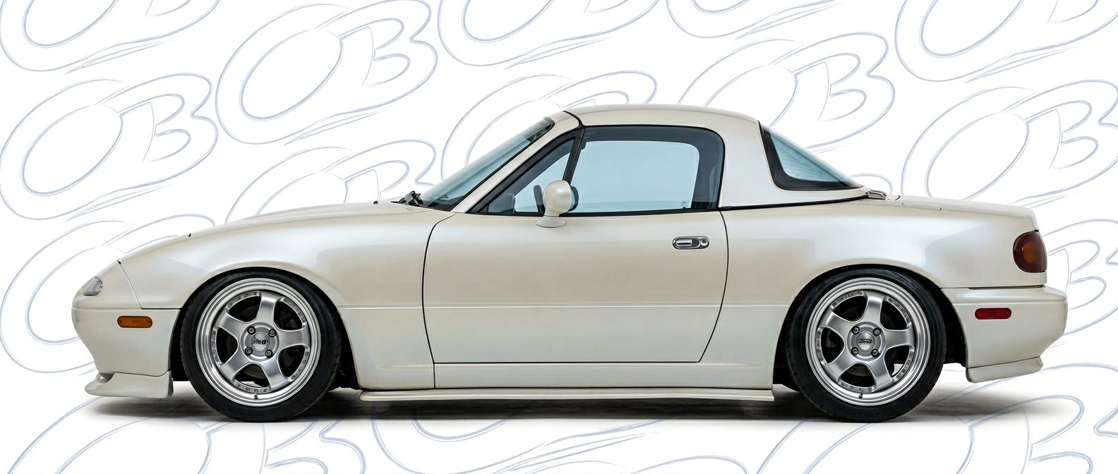 High-quality 1990 Mazda Miata 1990 exterior shot with professional studio lighting.