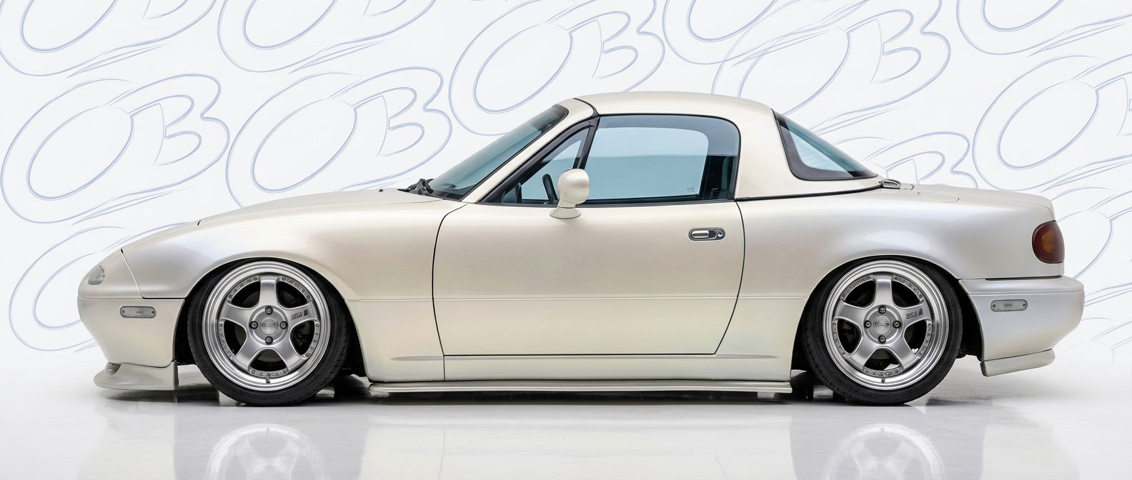 High-quality 1994 Mazda Miata 1994 exterior shot with professional studio lighting.
