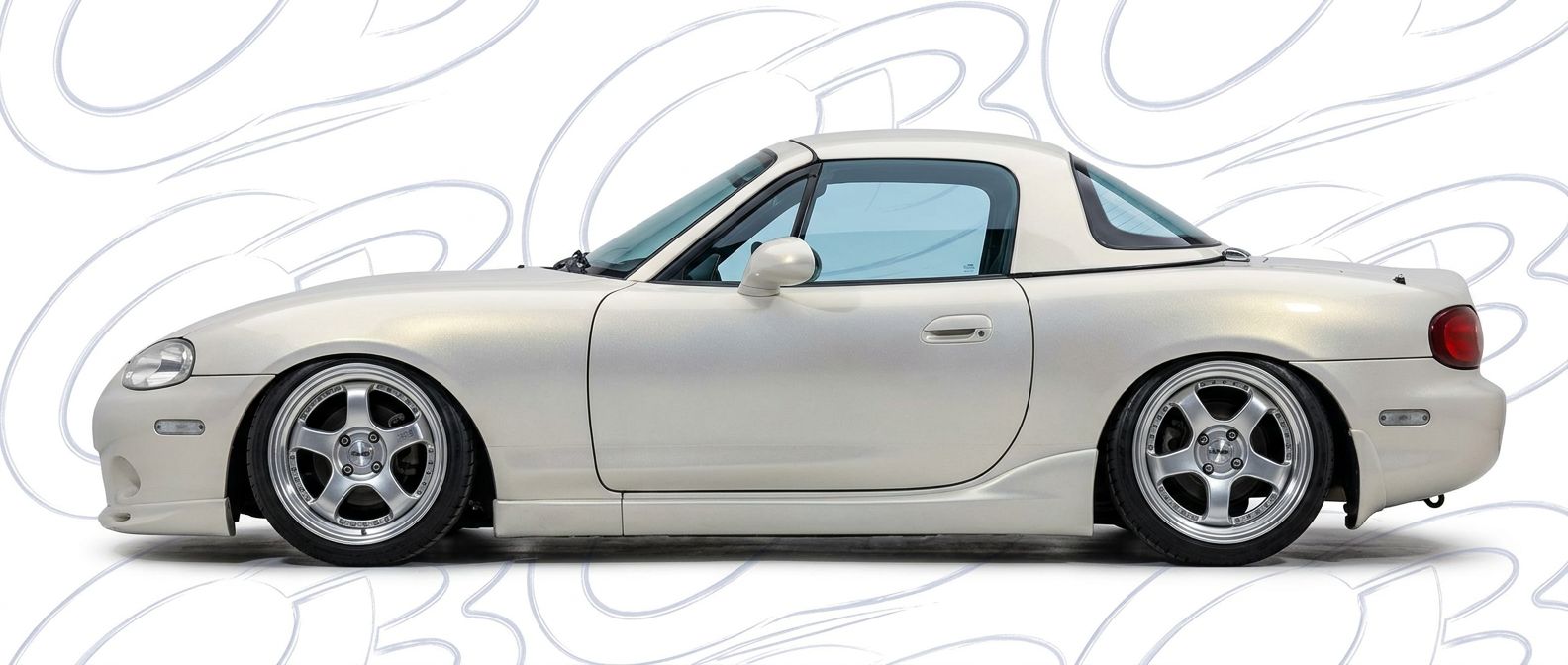 Detailed view of 2002 Mazda Miata 2002 featuring lightweight, durable construction.