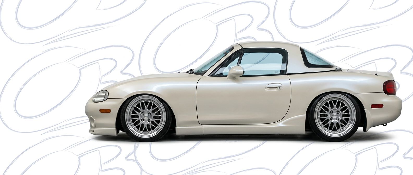 Front-angle view of 2003 Mazda Miata 2003 - Durable and stylish exterior enhancement.