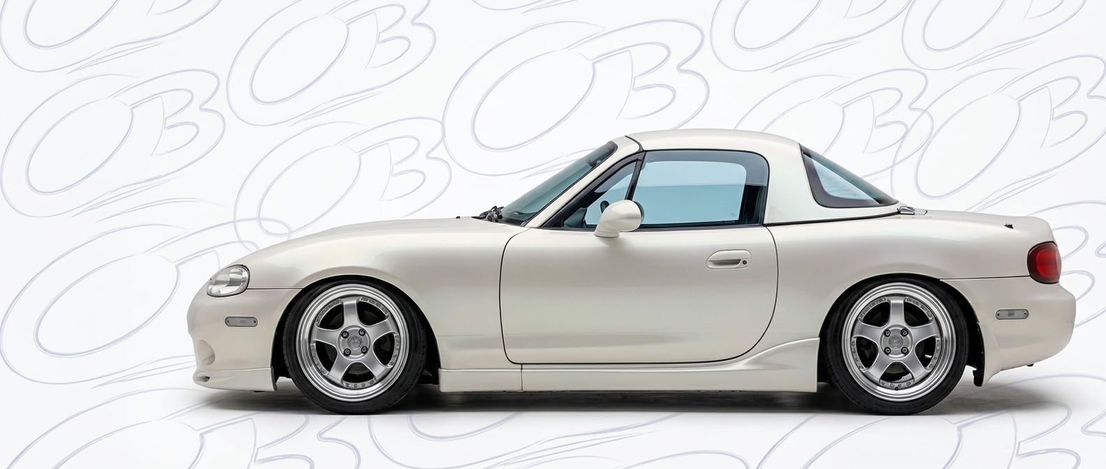 High-quality 2004 Mazda Miata 2004 exterior shot with professional studio lighting.
