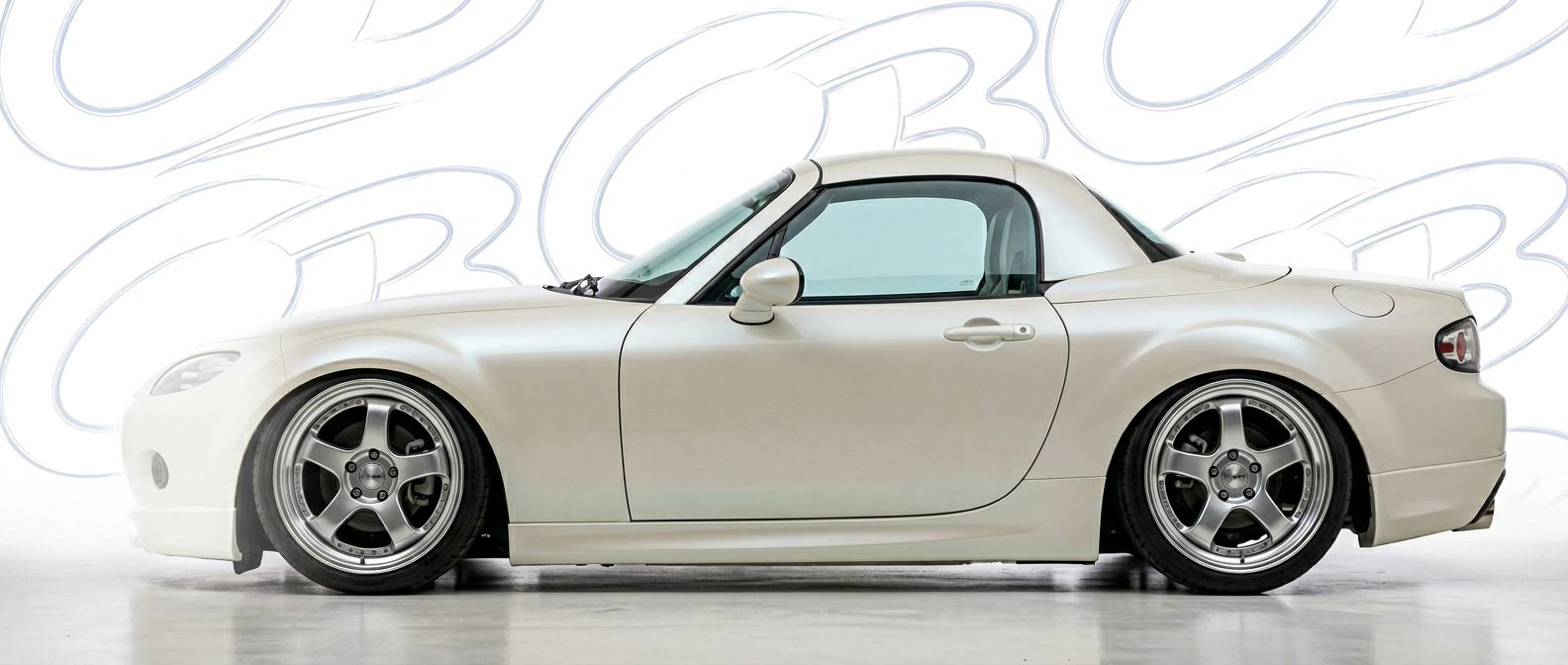 Top-tier 2006 Mazda Miata 2006 featuring a high-gloss finish and carbon fiber weave.