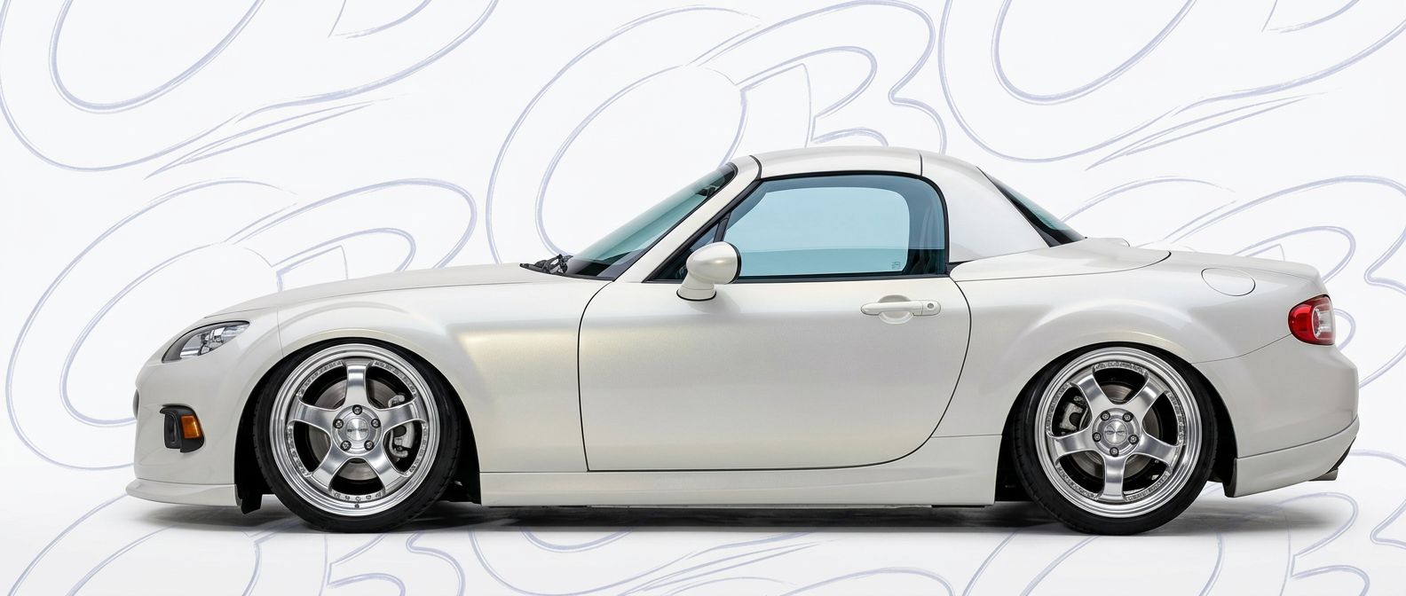 High-quality 2012 Mazda Miata 2012 exterior shot with professional studio lighting.