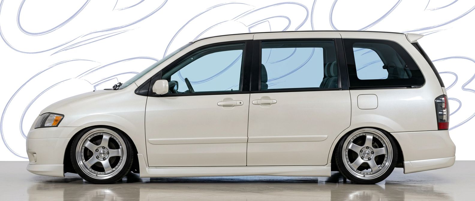 Front-angle view of 2001 Mazda MPV 2001 - Durable and stylish exterior enhancement.