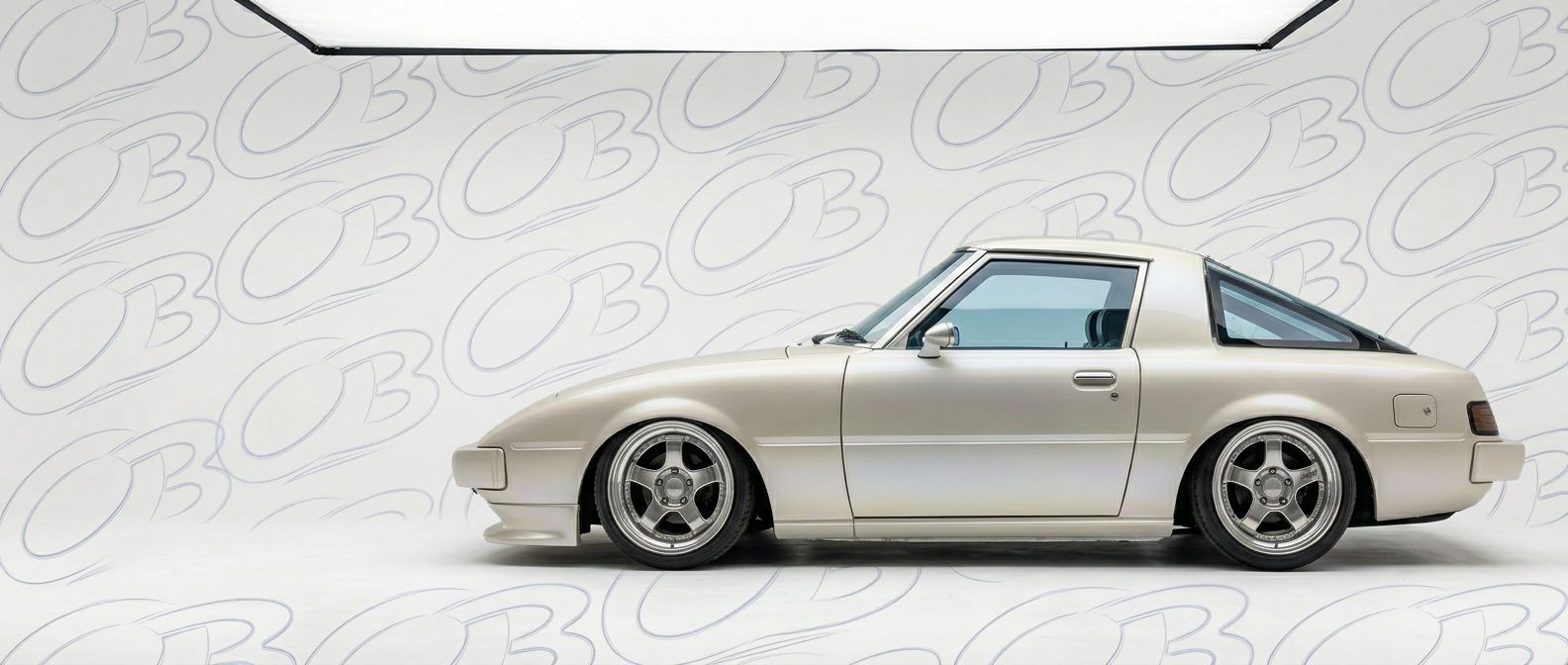 Professional automotive photography of a 1979 Mazda RX-7 with high-fidelity 1979.