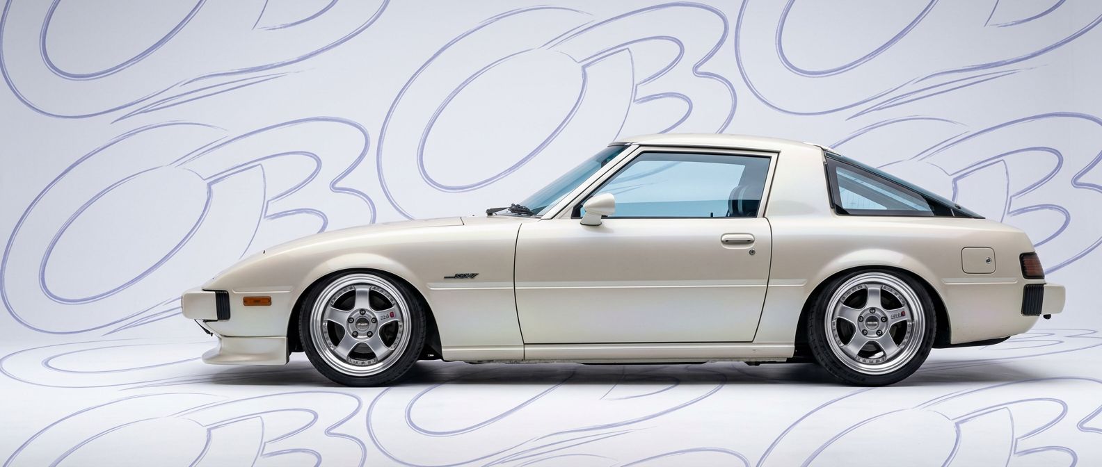 Front-angle view of 1980 Mazda RX-7 1980 - Durable and stylish exterior enhancement.