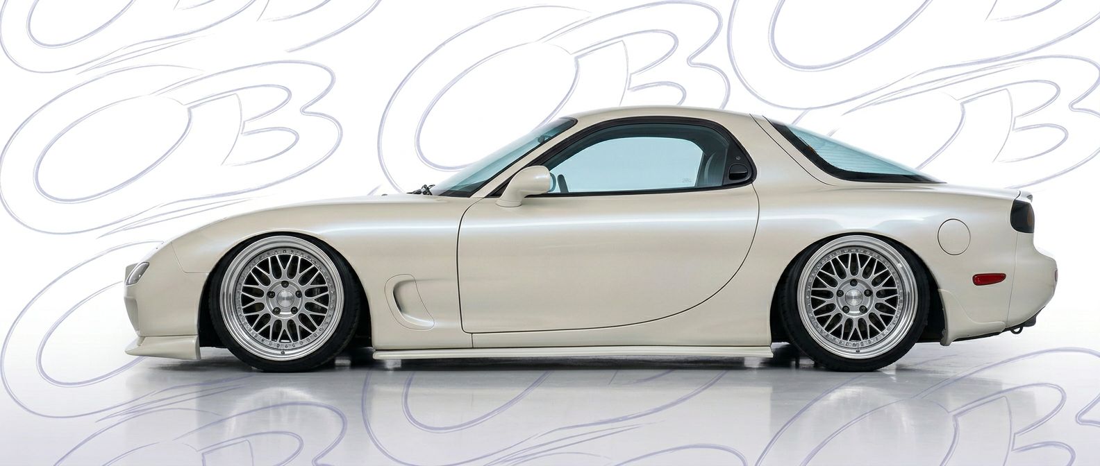 Top-tier  Mazda RX-7 2001 featuring a high-gloss finish and carbon fiber weave.