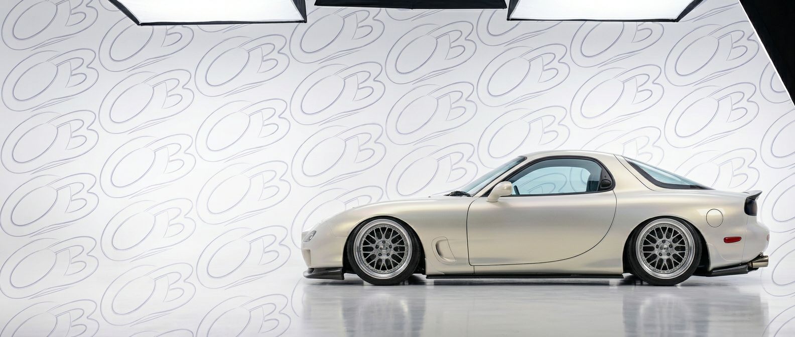 Mazda RX-7 - Bodykits, Bumpers, Fenders and more... Professional automotive photography of a Mazda RX-7 with high-fidelity 2002.