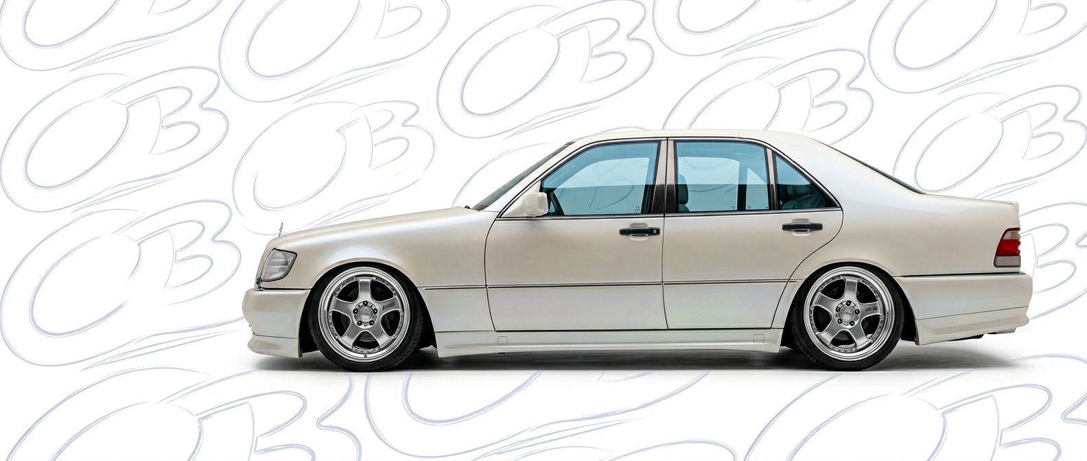 Professional automotive photography of a 1993 Mercedes-Benz S-Class with high-fidelity 1993.