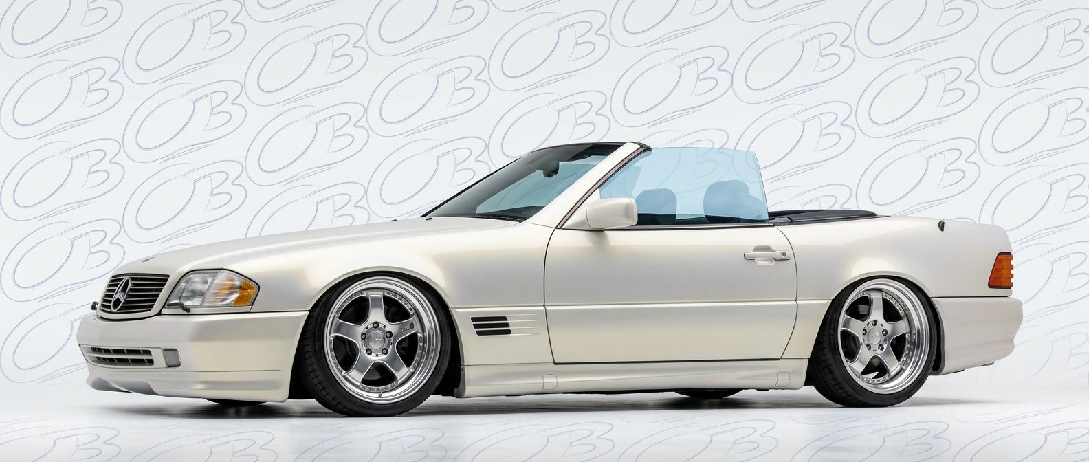 Professional automotive photography of a 1994 Mercedes-Benz SL-Class with high-fidelity 1994.