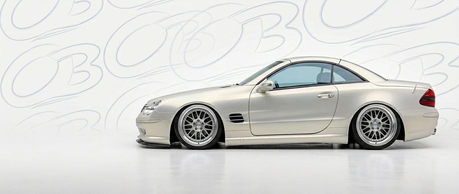 Aerodynamic 2002 Mercedes-Benz SL-Class 2002 - Sleek design for enhanced vehicle styling.