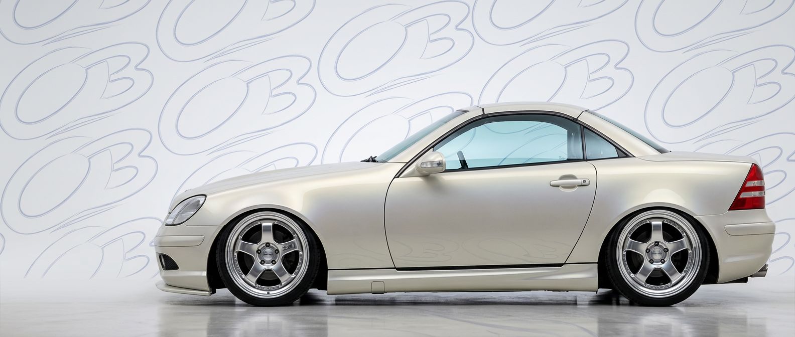 Top-tier 2002 Mercedes-Benz SLK-Class 2002 featuring a high-gloss finish and carbon fiber weave.