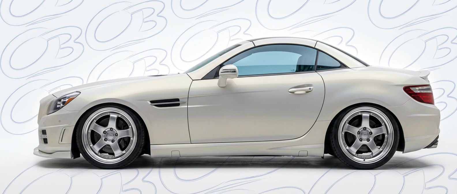 Top-tier 2015 Mercedes-Benz SLK-Class 2015 featuring a high-gloss finish and carbon fiber weave.