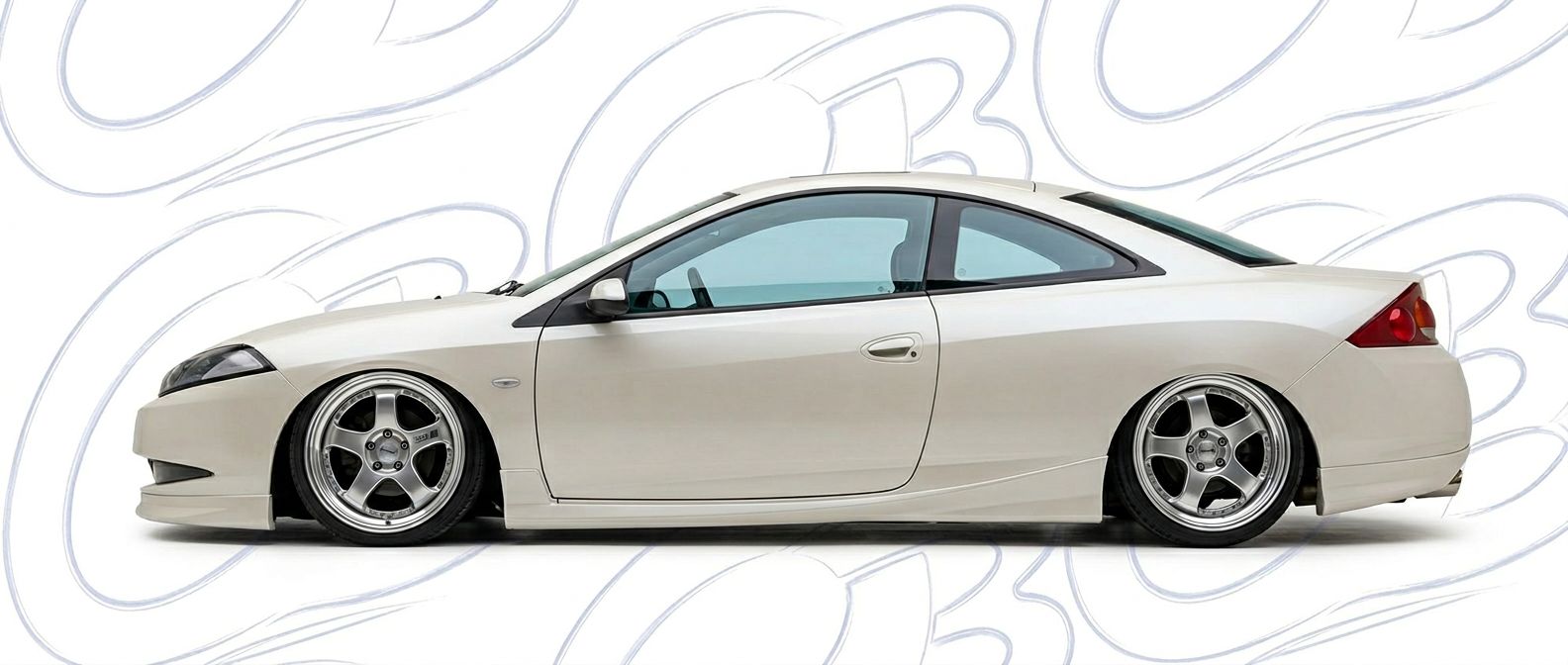 Top-tier 2002 Mercury Cougar 2002 featuring a high-gloss finish and carbon fiber weave.