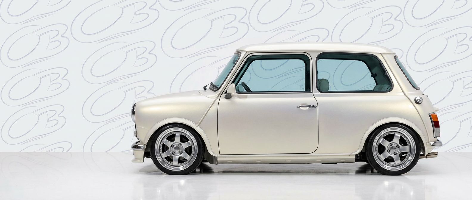 Professional automotive photography of a 1983 Mini Cooper with high-fidelity 1983.