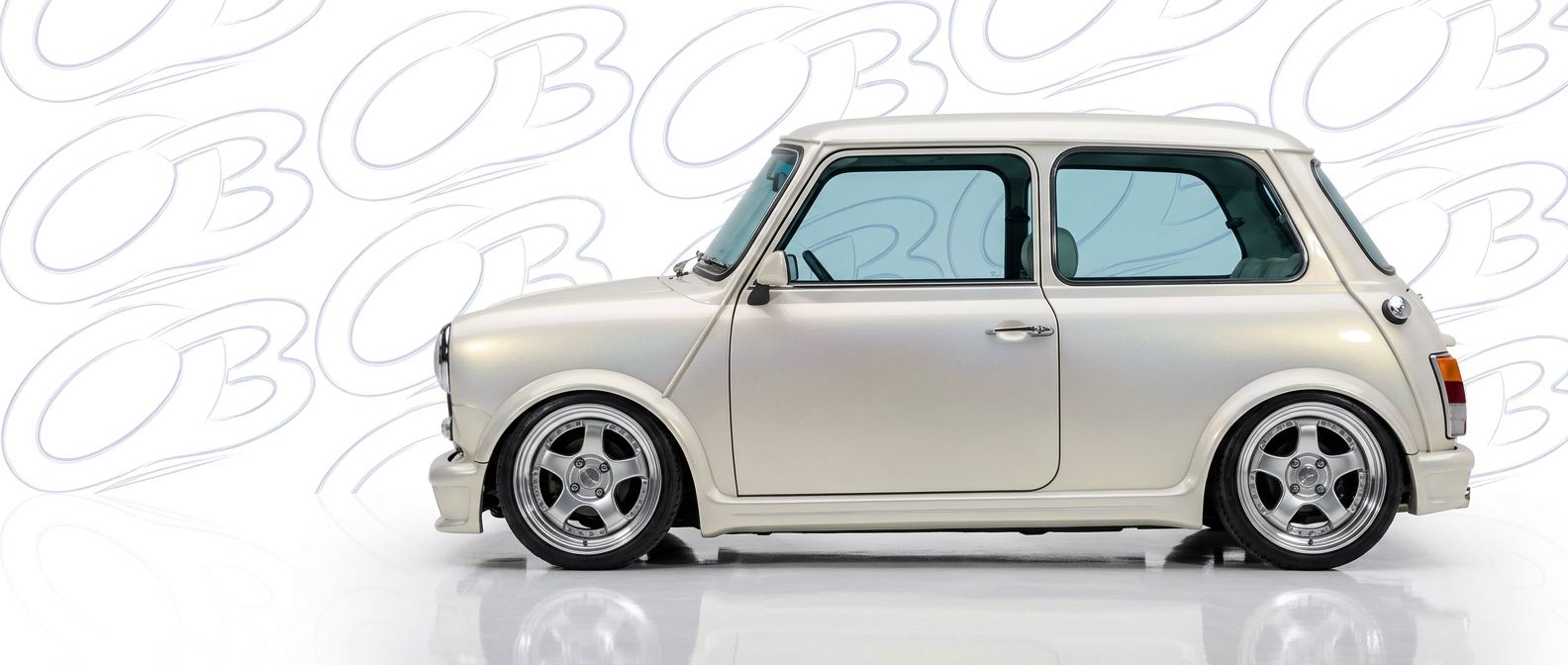 Top-tier 1989 Mini Cooper 1989 featuring a high-gloss finish and carbon fiber weave.
