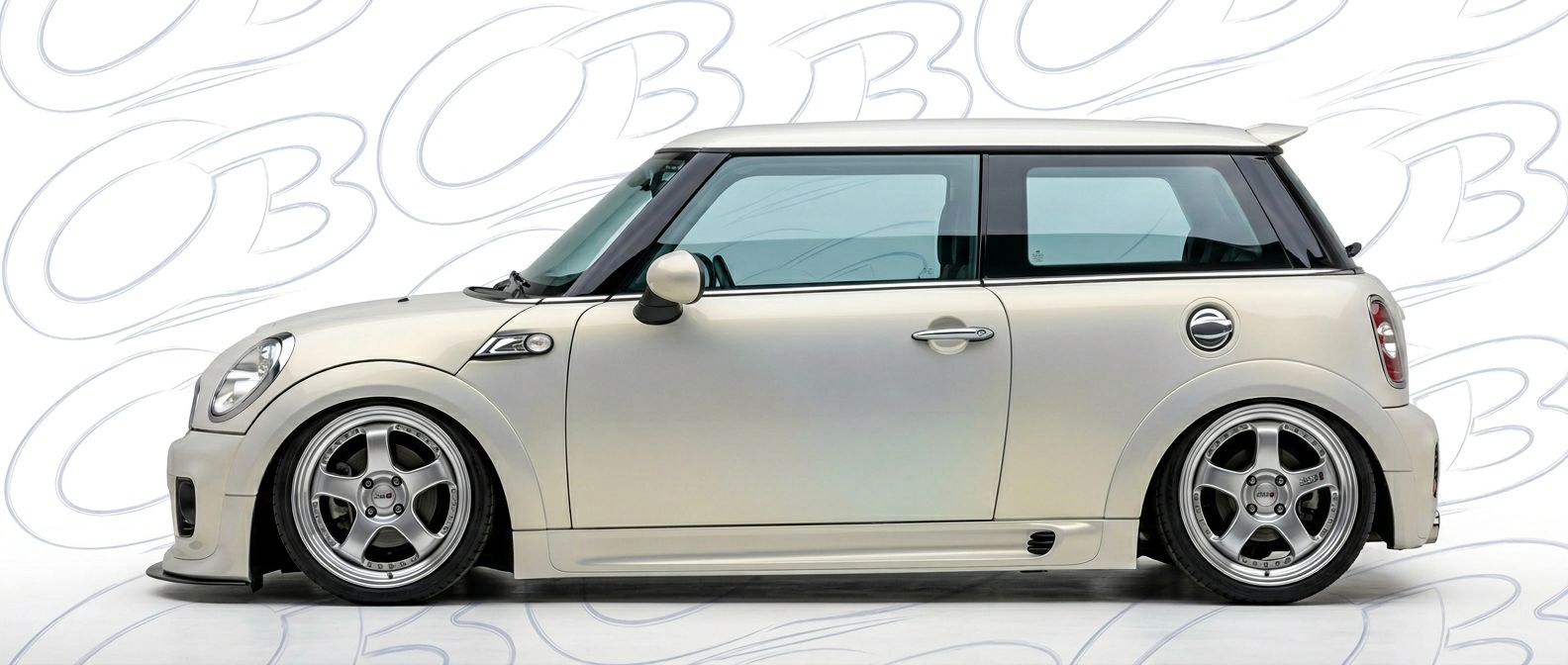 Professional automotive photography of a 2009 Mini Cooper with high-fidelity 2009.