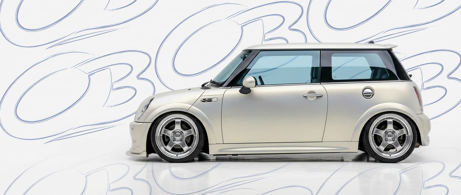 Mini Cooper - Bodykits, Bumpers, Fenders and more... High-quality Mini Cooper Cooper exterior shot with professional studio lighting.