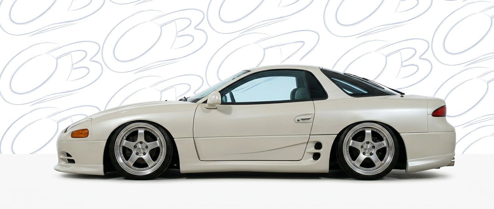 Professional automotive photography of a 1991 Mitsubishi 3000GT with high-fidelity 1991.