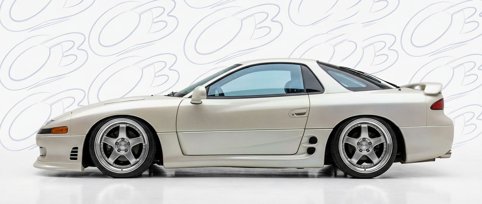 Professional automotive photography of a 1996 Mitsubishi 3000GT with high-fidelity 1996.