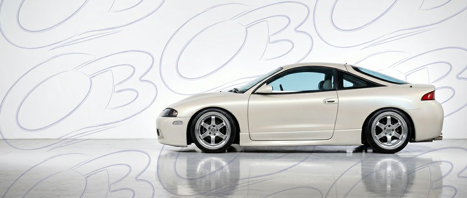 Top-tier 1998 Mitsubishi Eclipse 1998 featuring a high-gloss finish and carbon fiber weave.