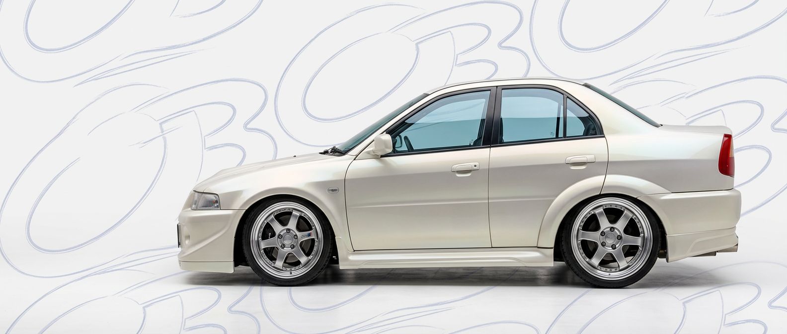 High-quality 2000 Mitsubishi Evolution 2000 exterior shot with professional studio lighting.