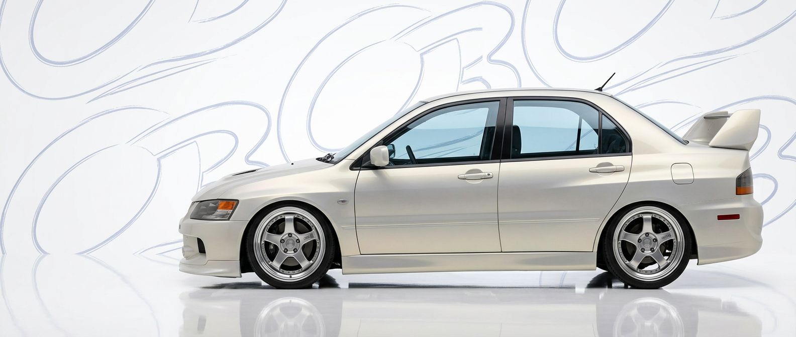 Custom 2005 for 2005 Mitsubishi Evolution - Premium aerodynamic automotive body parts.