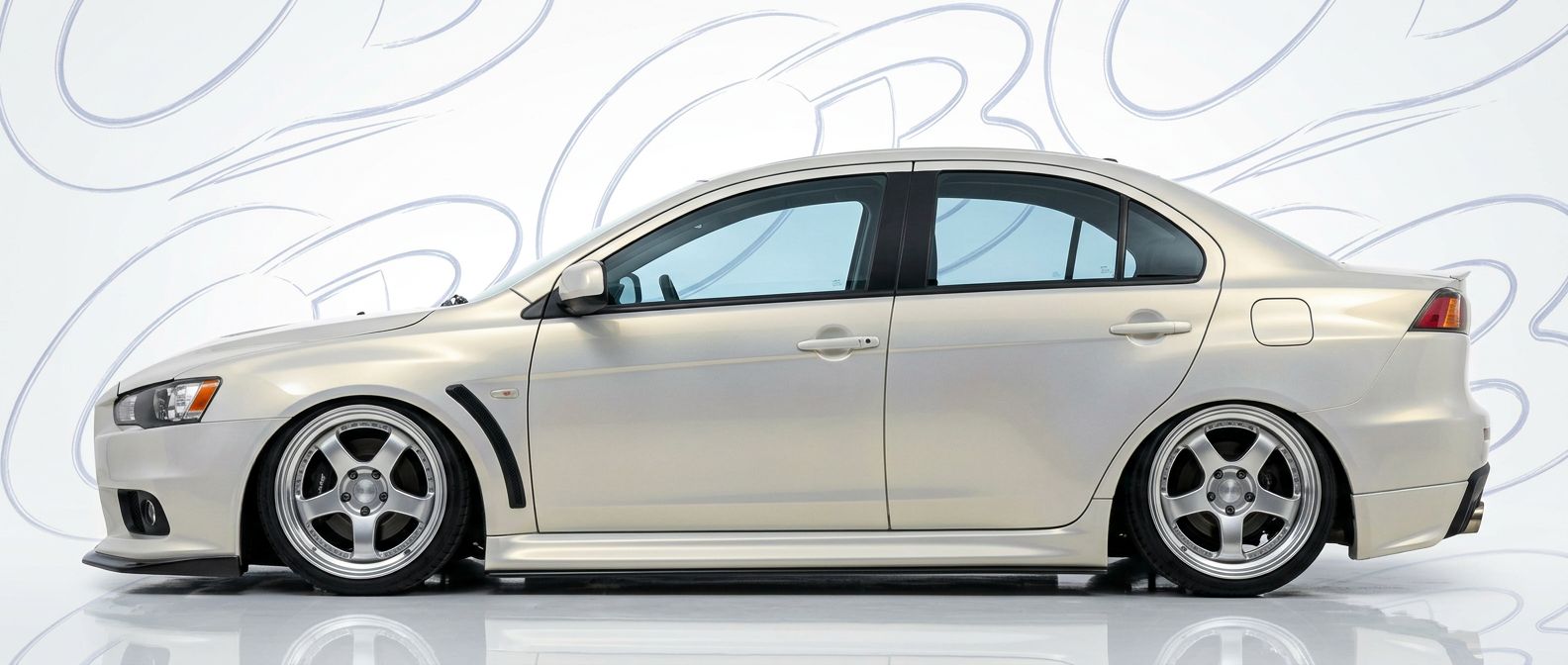 Top-tier 2016 Mitsubishi Evolution 2016 featuring a high-gloss finish and carbon fiber weave.