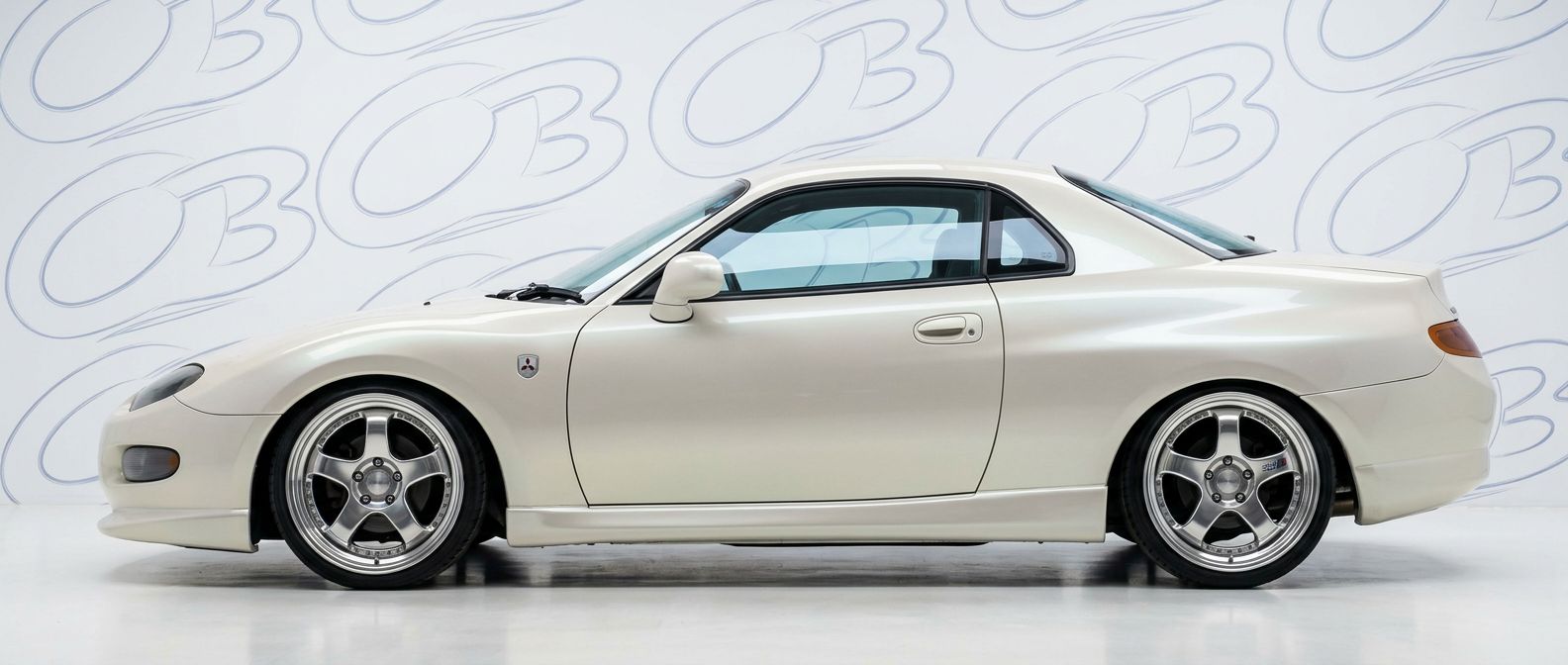 Front-angle view of 1995 Mitsubishi FTO 1995 - Durable and stylish exterior enhancement.