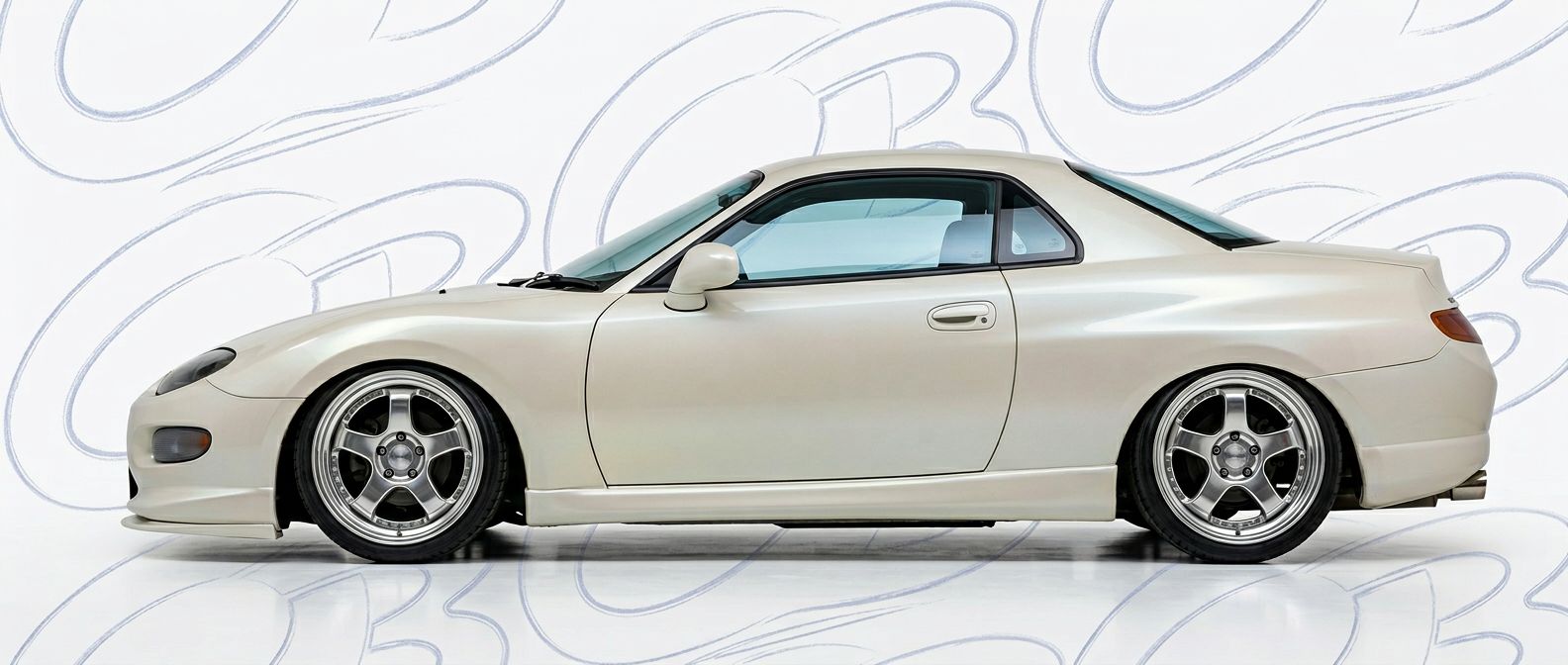 Top-tier 1998 Mitsubishi FTO 1998 featuring a high-gloss finish and carbon fiber weave.
