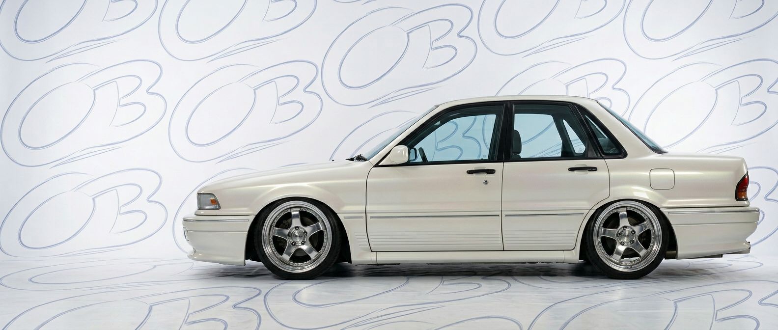 High-quality 1990 Mitsubishi Galant 1990 exterior shot with professional studio lighting.