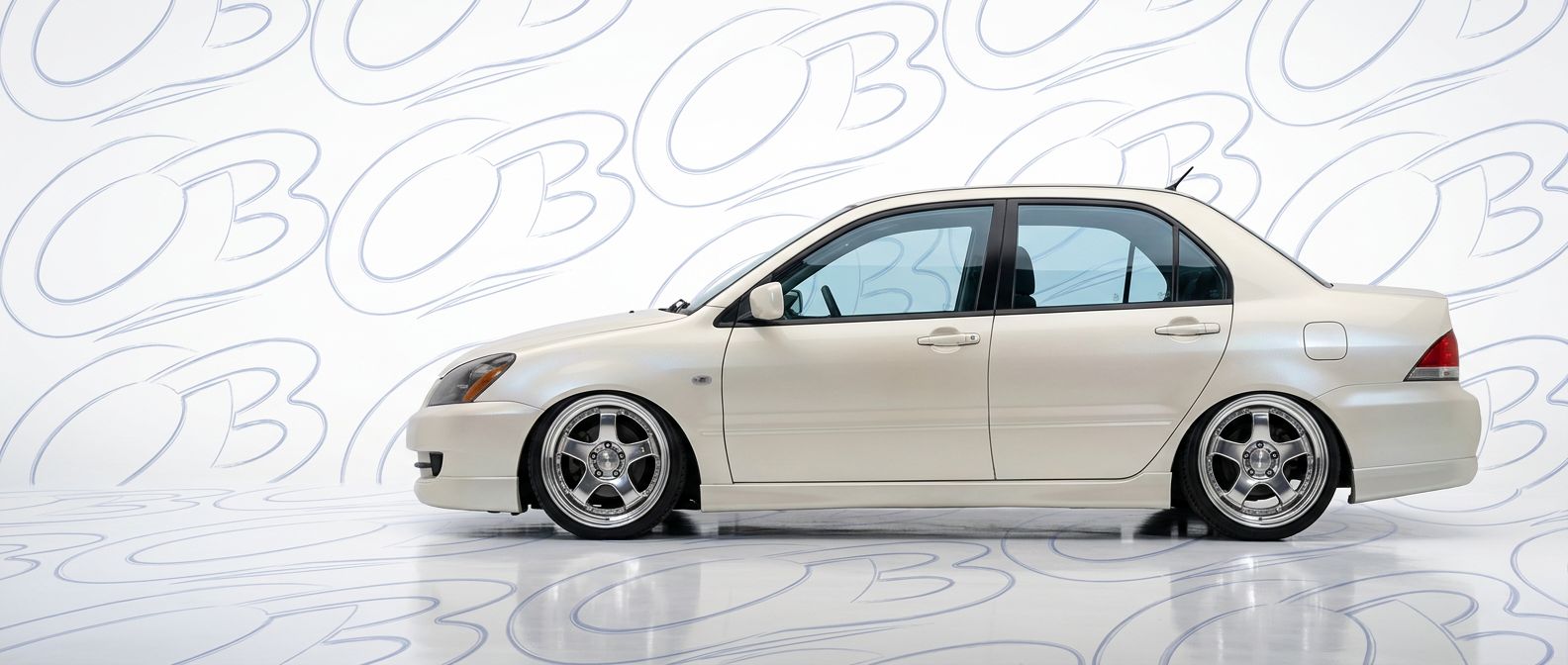 Front-angle view of 2004 Mitsubishi Lancer 2004 - Durable and stylish exterior enhancement.