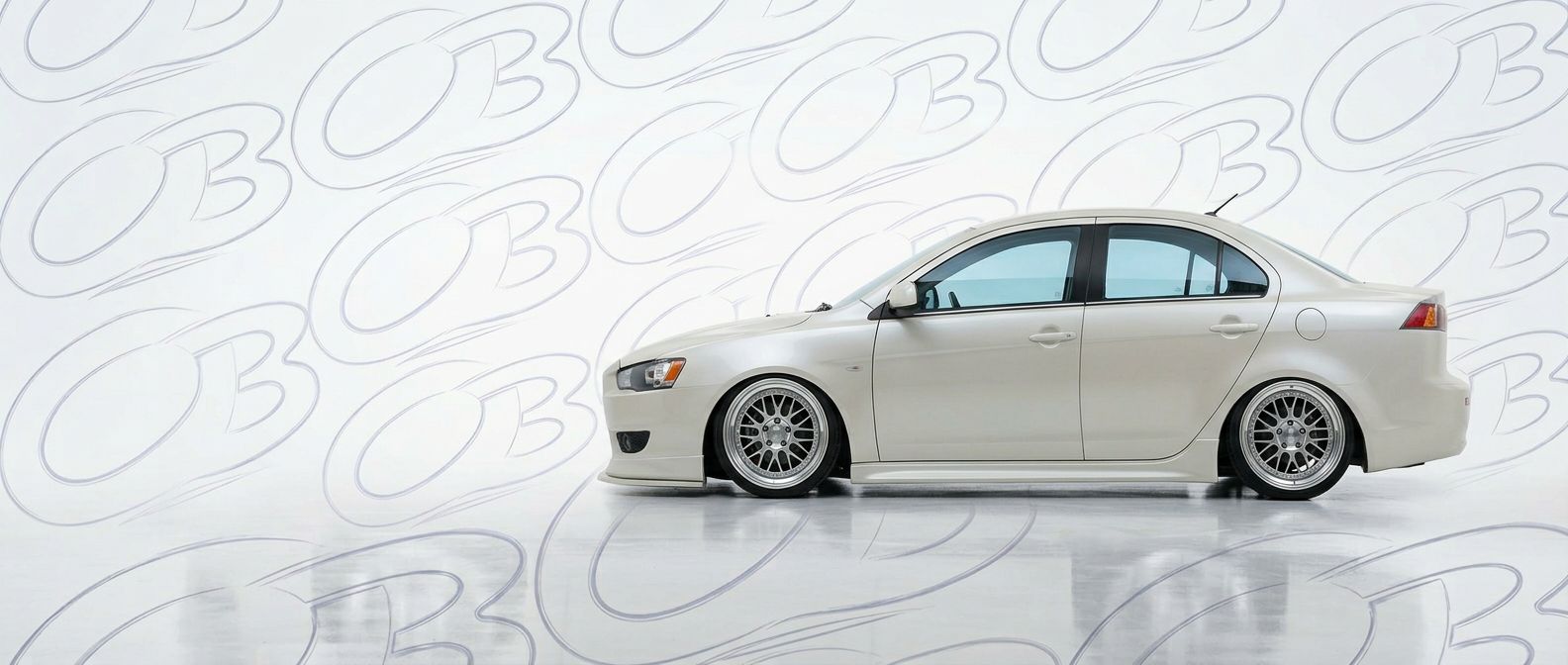 Top-tier 2010 Mitsubishi Lancer 2010 featuring a high-gloss finish and carbon fiber weave.